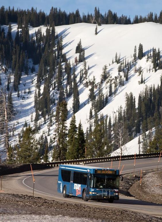 START BUS coming down Teton Pass BIG VIEW