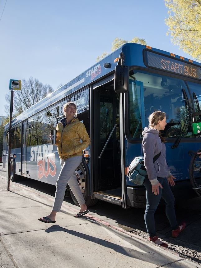 START BUS and Bike Combo with people getting off bus