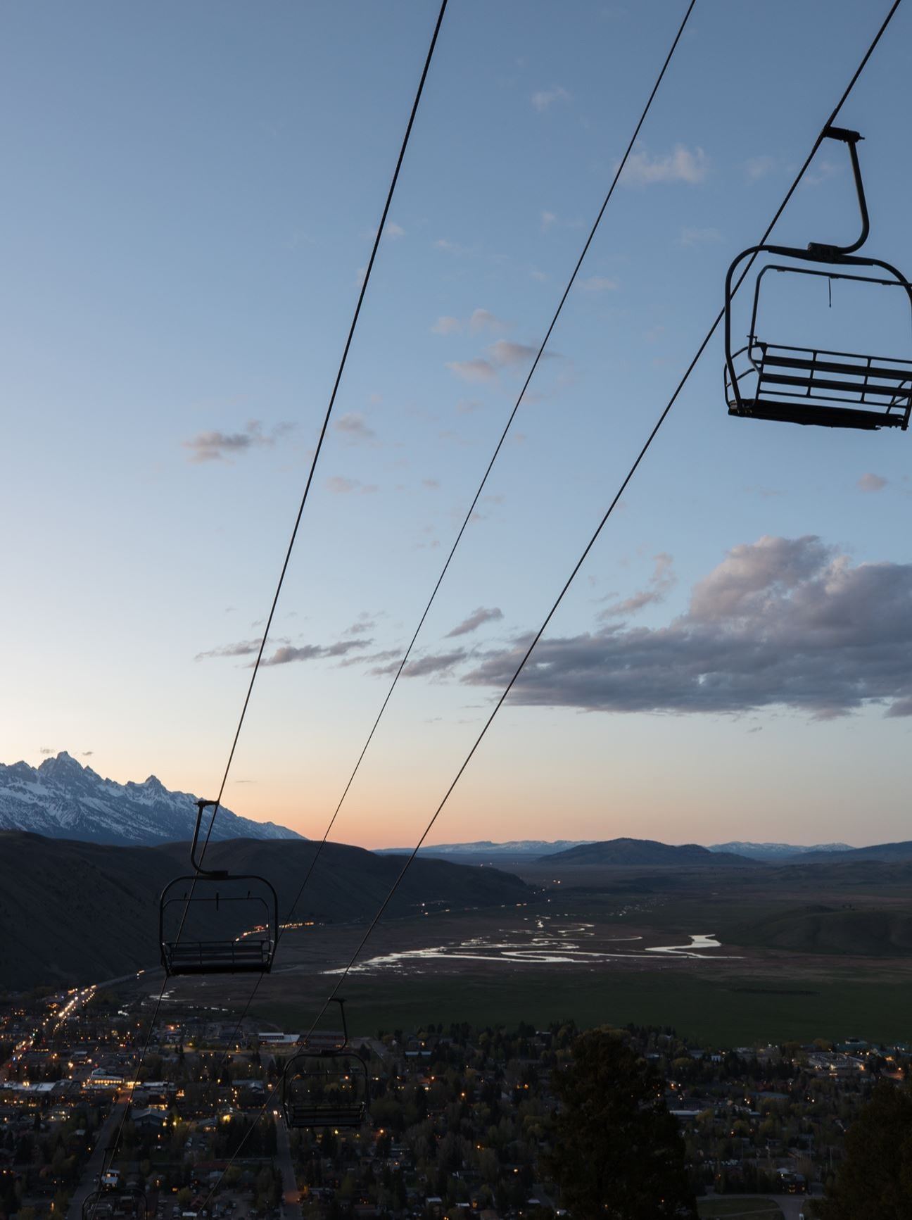 Snow King chairlift sunset with tetons
