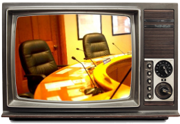 Television showing a live meeting