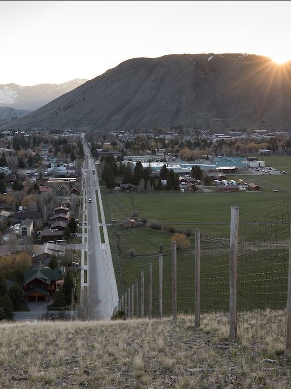Long View Down Broadway with Elk Refuge at Sunset