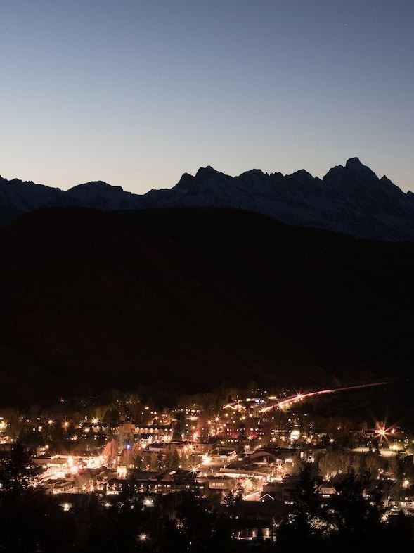 Town at night Outline of Tetons