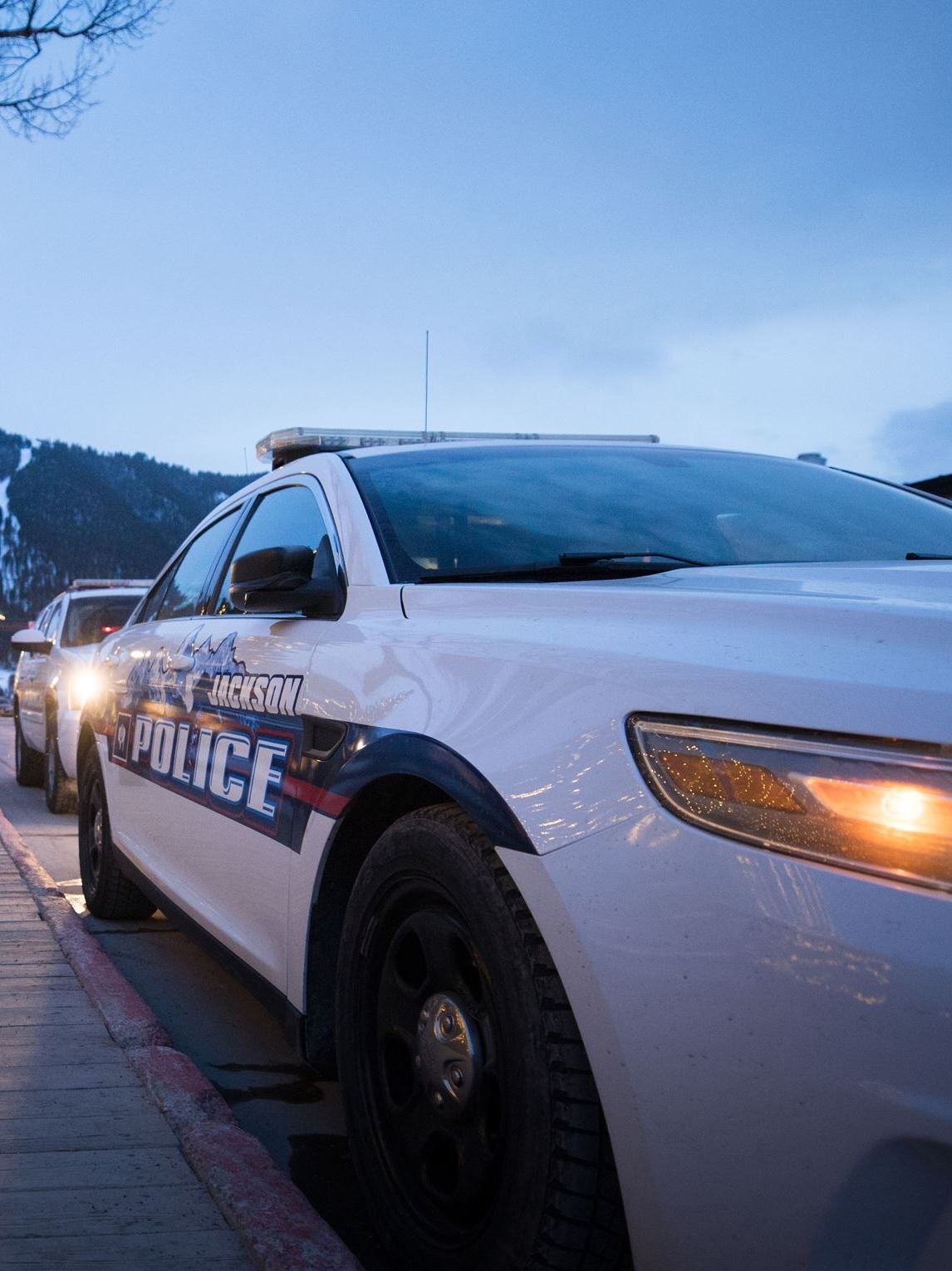 Police Squad Car at Town Square at Dusk